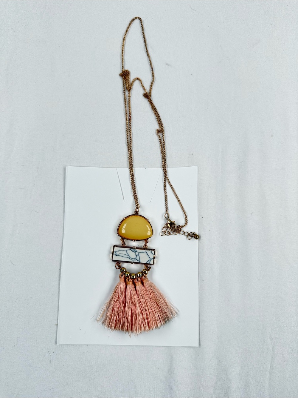 Gold-Tone Necklace with Yellow Stone, White Marble Accent & Pink Tassel